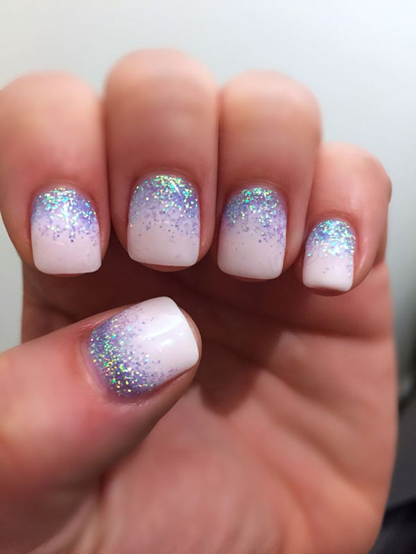 Blizgučiai ir Swarovski akmenys kaip žiemos manikiūro 2016-2017 m. Tendencija